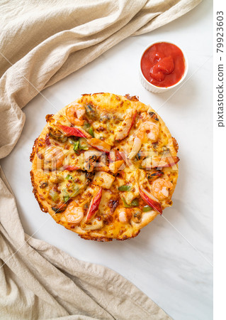 seafood pizza on wood tray seafood pizza on wood tray 79923603