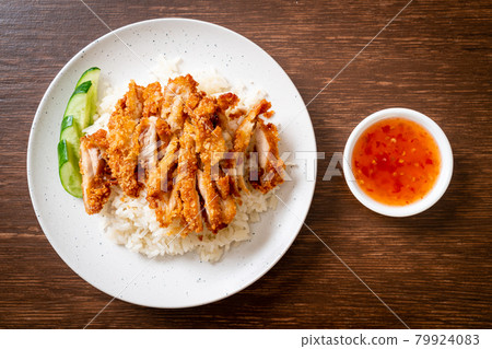 Hainanese chicken rice with fried chicken Hainanese chicken rice with fried chicken 79924083