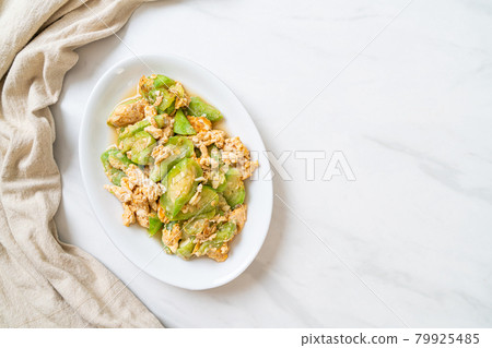 Stir Fried Angled Gourd with Egg Stir Fried Angled Gourd with Egg 79925485