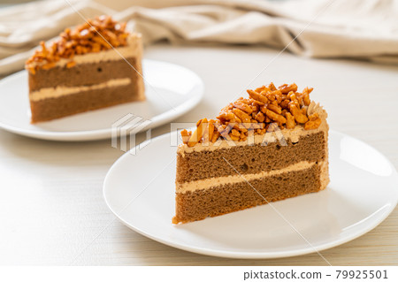 coffee almonds cake on plate 79925501
