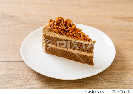 coffee almonds cake on plate 79925506