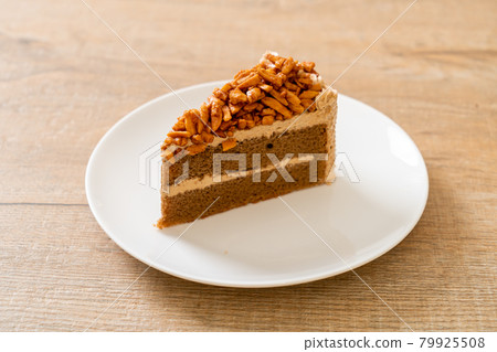 coffee almonds cake on plate 79925508