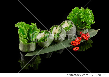 Green roll in mamenori with tofu, wakame, asparagus, avocado, cucumber, lettuce Green roll in mamenori with tofu, wakame, asparagus, avocado, cucumber, lettuce 79928198