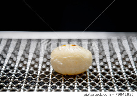 Mochi baked with shichirin and bincho charcoal Mochi baked with shichirin and bincho charcoal 79941955