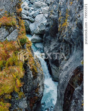 Canyon and waterfall. Highest mountain landscape with river 79955371