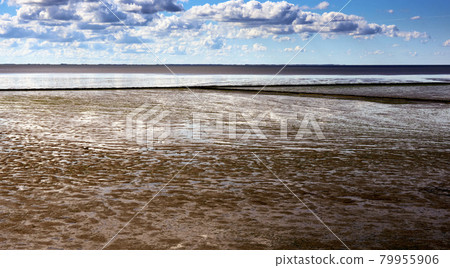 Wadden Sea of the North Sea under clouds and view over the silt on the mainland, Sylt, Germany Wadden Sea of the North Sea under clouds and view over the silt on the mainland, Sylt, Germany 79955906