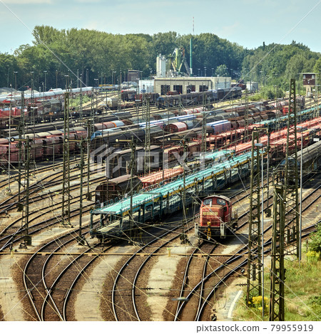 marshalling yard with tracks, switches, freight trains and the signal box, Germany marshalling yard with tracks, switches, freight trains and the signal box, Germany 79955919