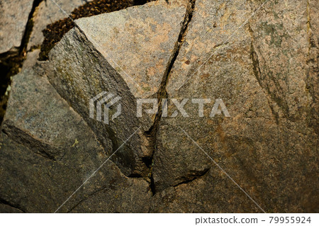 Close-up view of a fissured sandstone Close-up view of a fissured sandstone 79955924