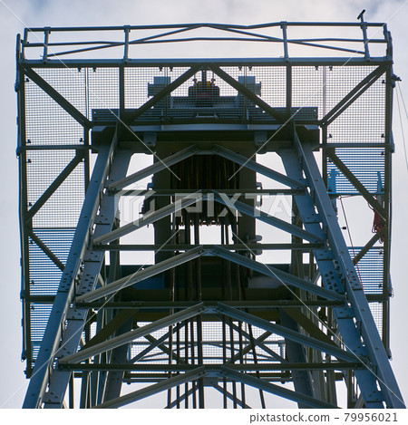 Upper platform of the tower of an oil production plant made of steel grid elements Upper platform of the tower of an oil production plant made of steel grid elements 79956021