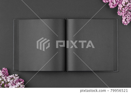 Notebook with pen and lilac. Notebook with pen and lilac. 79956521