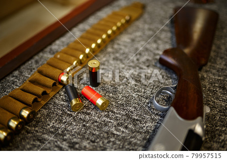 Hunting rifle, bandolier and cartridges, gun store 79957515