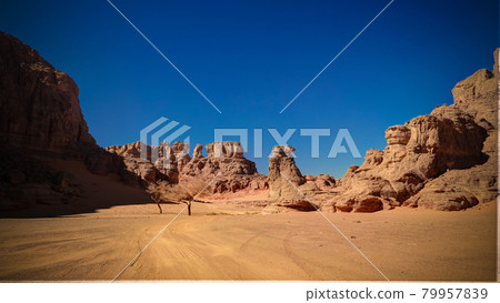 Landscape of sand dune and sandstone nature sculpture at Tamezguida in Tassili nAjjer national park, Algeria Landscape of sand dune and sandstone nature sculpture at Tamezguida in Tassili nAjjer national park, Algeria 79957839