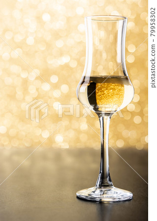 Italian golden grappa drink Italian golden grappa drink 79958302