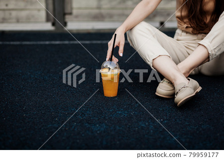 woman with smoothie drinking plastic cup woman with smoothie drinking plastic cup 79959177