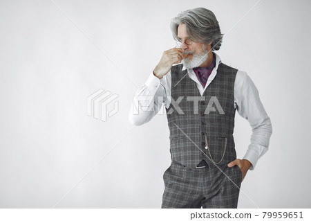 Handsome pensive mature businessman in formal suit 79959651