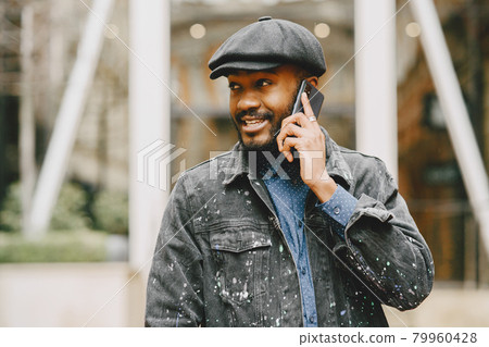Outdoor portrait of an African business man 79960428