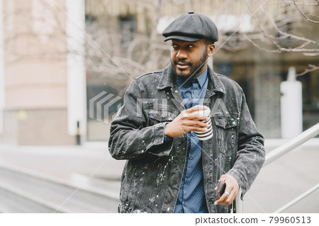 Outdoor portrait of an African business man 79960513