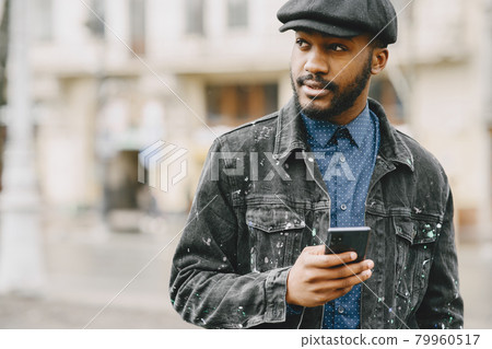 Outdoor portrait of an African business man Outdoor portrait of an African business man 79960517