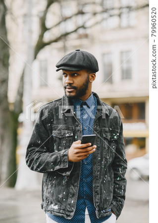 Outdoor portrait of an African business man Outdoor portrait of an African business man 79960520