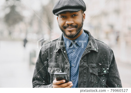 Outdoor portrait of an African business man Outdoor portrait of an African business man 79960527