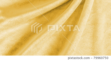 Gold velvet background or golden yellow velour flannel texture made of cotton or wool with soft fluffy velvety satin fabric cloth metallic color material 79960750