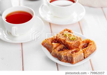 Traditional Baklava on Wooden Table Traditional Baklava on Wooden Table 79962037