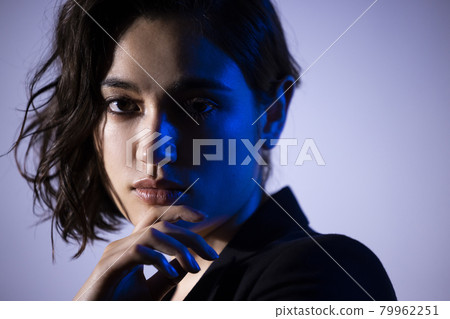 A woman wearing a jacket A woman wearing a jacket 79962251