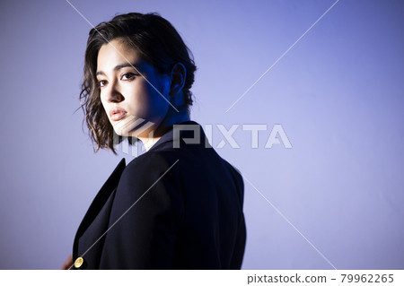 A woman wearing a jacket A woman wearing a jacket 79962265