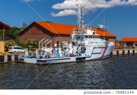 Swinoujscie. Marine ship at the city embankment. Swinoujscie. Marine ship at the city embankment. 79965144