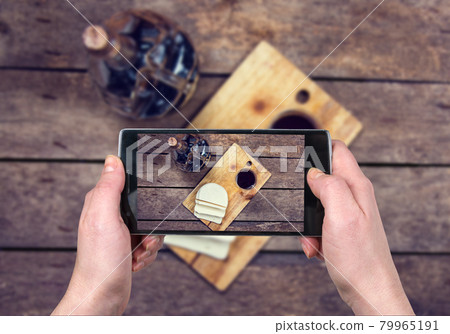 Taking the photo of the food with smartphone Taking the photo of the food with smartphone 79965191
