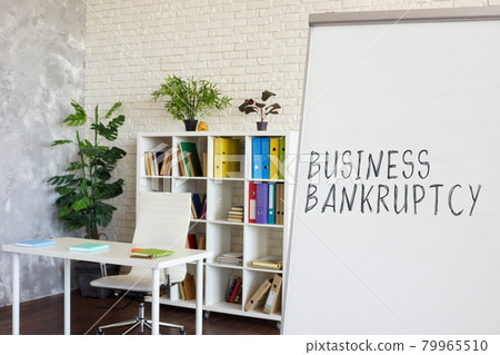 Empty office and words Business bankruptcy on the whiteboard. Empty office and words Business bankruptcy on the whiteboard. 79965510