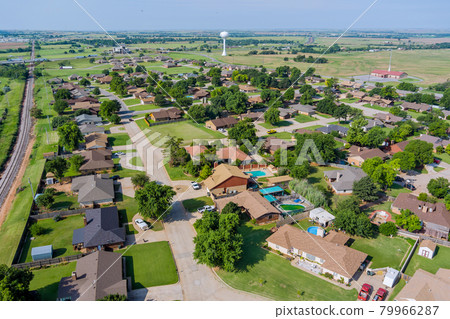 Overlooking view of a small town a Clinton in the highways, US Rte 66 interchanges of Oklahoma USA Overlooking view of a small town a Clinton in the highways, US Rte 66 interchanges of Oklahoma USA 79966287