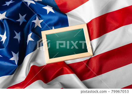 Blank frame on American flag background 79967053