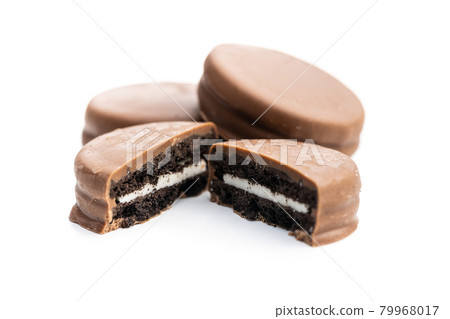 Biscuits with chocolate icing 79968017