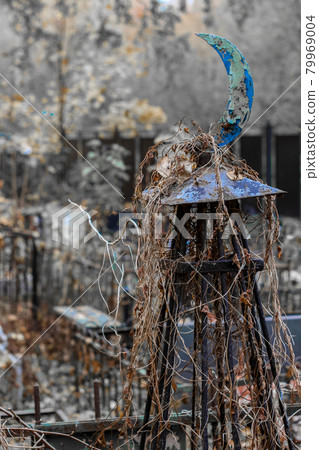 religious symbol of Islam iron steel crescent moon near the grave in the cemetery 79969004