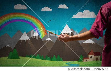 Close up artist hand holding paintbrush Close up artist hand holding paintbrush 79969766