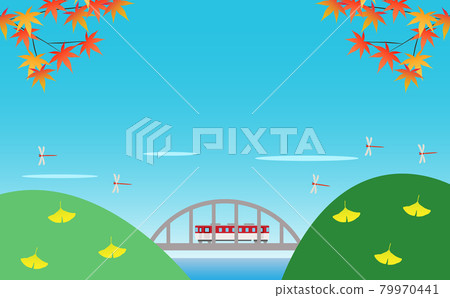 A train running on a mountain arch bridge in the clear autumn 79970441