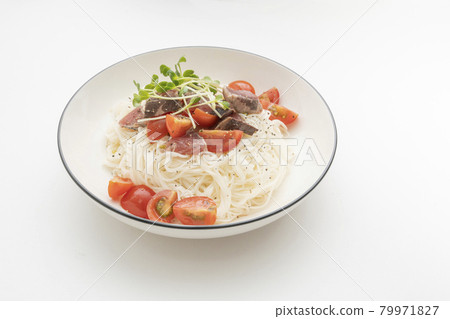 Arranged somen noodles with bonito flakes and petit tomatoes Arranged somen noodles with bonito flakes and petit tomatoes 79971827