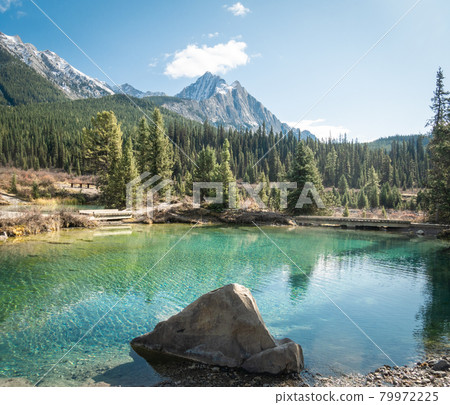 Beautiful alpine scenery with dominant mountain in background and azure tarn in foreground, shot at Ink Pots, Banff National Park, Alberta, Canada Beautiful alpine scenery with dominant mountain in background and azure tarn in foreground, shot at Ink Pots, Banff National Park, Alberta, Canada 79972225