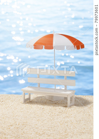 Summer sandy beaches, white benches and beach umbrellas Summer sandy beaches, white benches and beach umbrellas 79973601