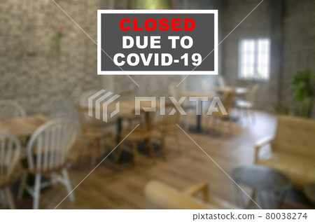 Defocused or blur view of the interior of a restaurant. Closed due to Covid-19. 80038274