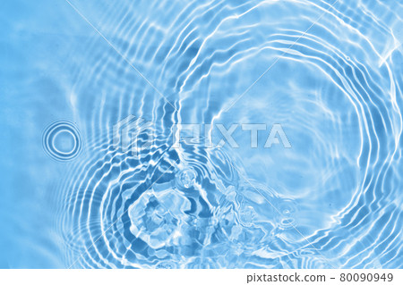 Blurred transparent blue colored clear water surface texture. Water waves in sunlight. Blurred transparent blue colored clear water surface texture. Water waves in sunlight. 80090949