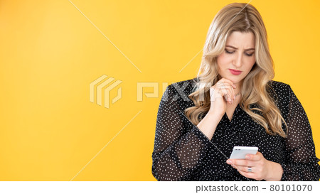 social media anxiety confused obese woman phone 80101070