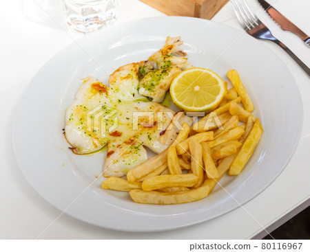 Cuttlefish with French fries and lemon Cuttlefish with French fries and lemon 80116967