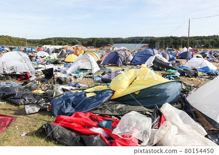 Field and tent village after the rock festival Smukfest in Skanderborg, Denmark Field and tent village after the rock festival Smukfest in Skanderborg, Denmark 80154450