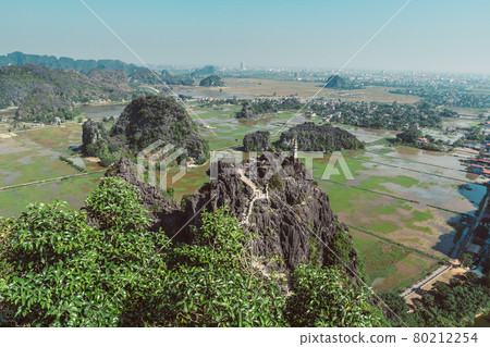 Scenic view of beautiful karst scenery and rice paddy fields Scenic view of beautiful karst scenery and rice paddy fields 80212254