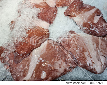 Lots of freshly sliced octopus meat Lots of freshly sliced octopus meat 80222699