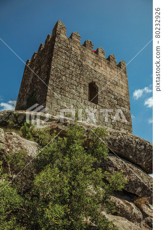 Square tower made of stone in a castle 80232926