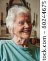 Portrait of old lady with white hair and smile 80244675