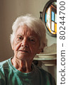 Portrait of old lady with white hair 80244700